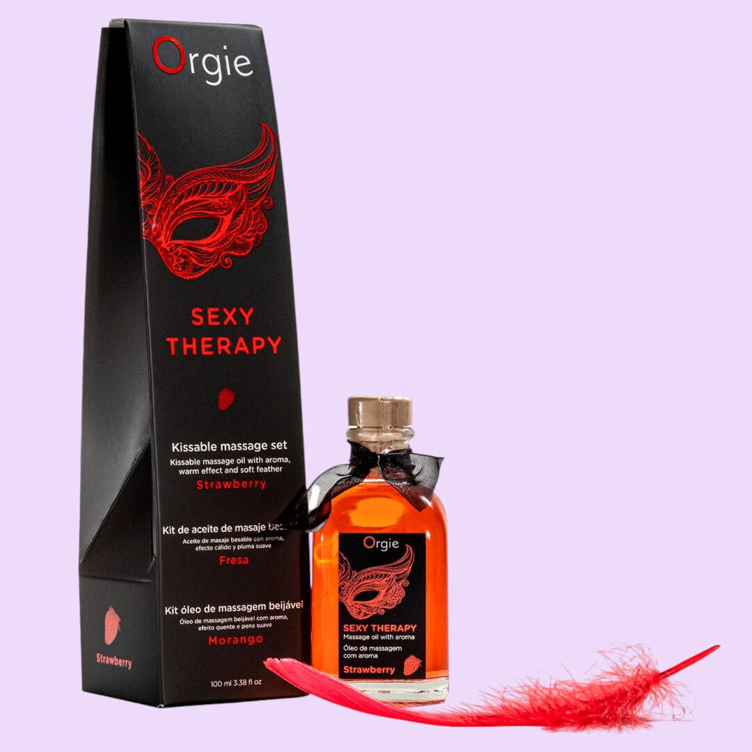 Набір для масажу Orgie – Sexy Therapy Strawberry (100 мл), їстівна розігрівальна олія + пір'їнка