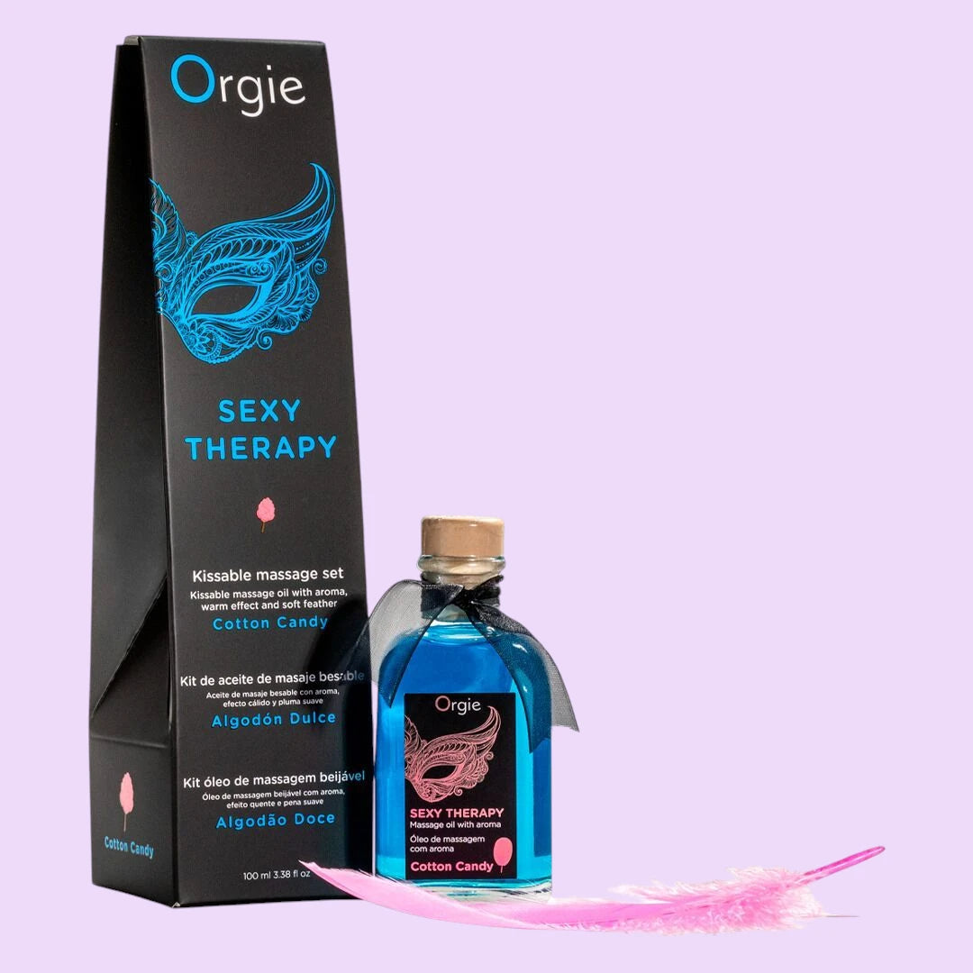 Набір для масажу Orgie – Sexy Therapy Cotton Candy (100 мл), їстівна розігрівальна олія + пір'їнка